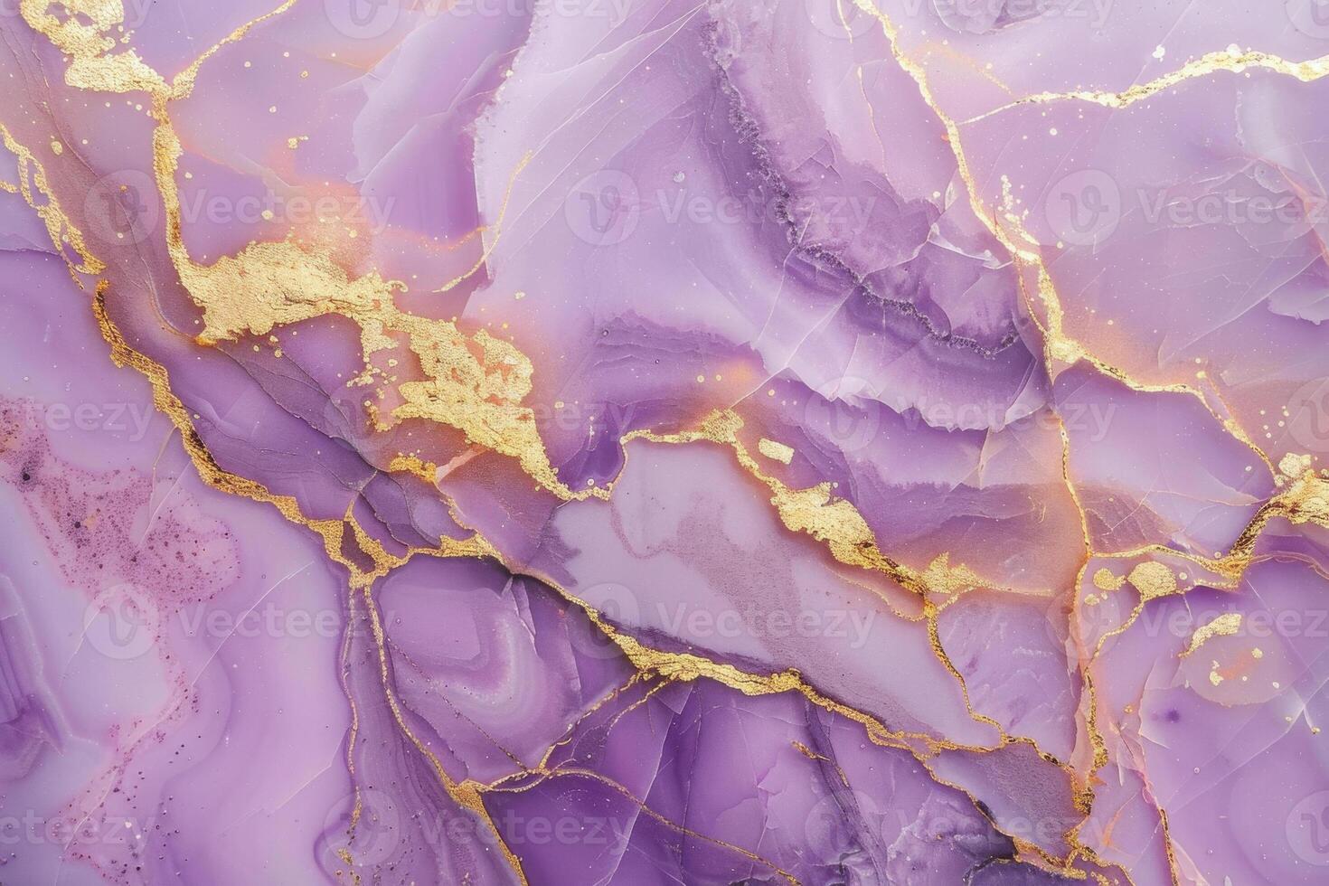 A purple marble background with gold paint photo