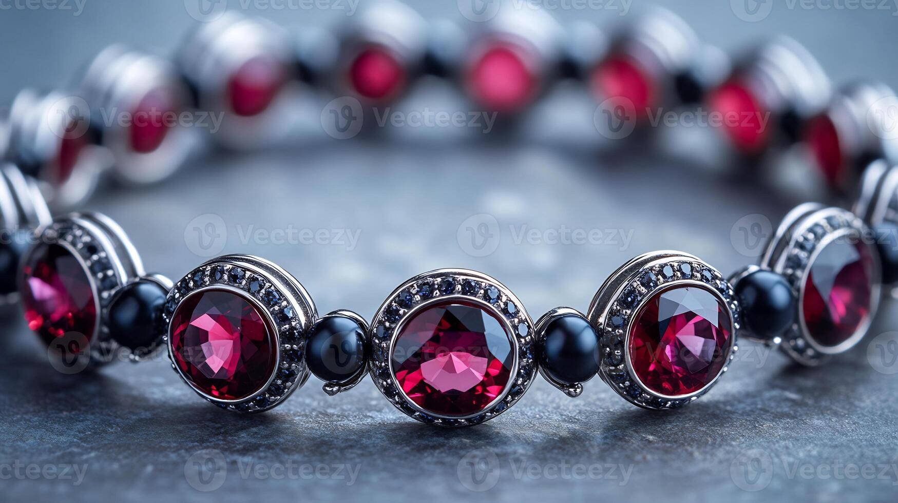 Bracelet featuring shimmering rubies black pearls on a delicate silver chain with a closeup of each textured gem on a white backdrop photo