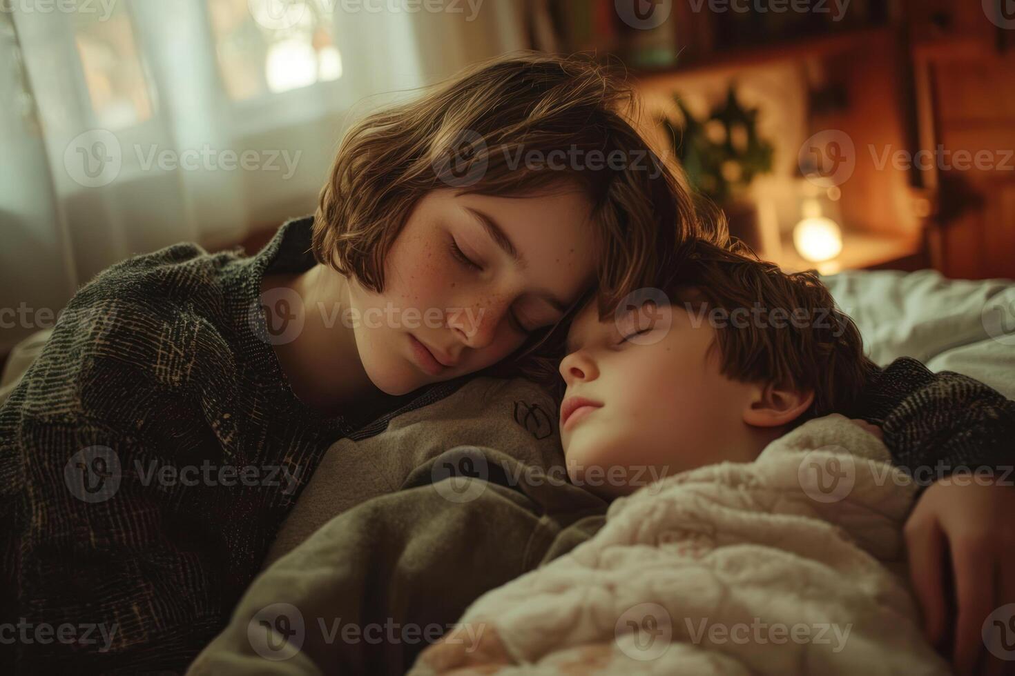 A Teenager comforting younger sibling in soft bedroom setting, showing empathy and warmth photo
