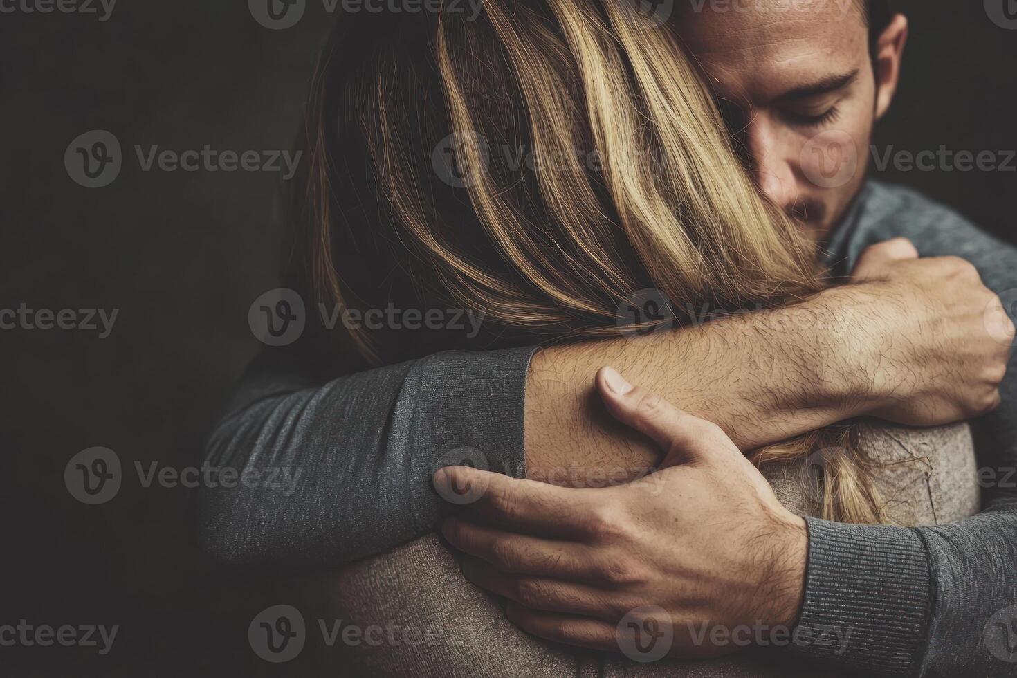 Friends supporting each other in comforting hug, showing trust and connection. photo