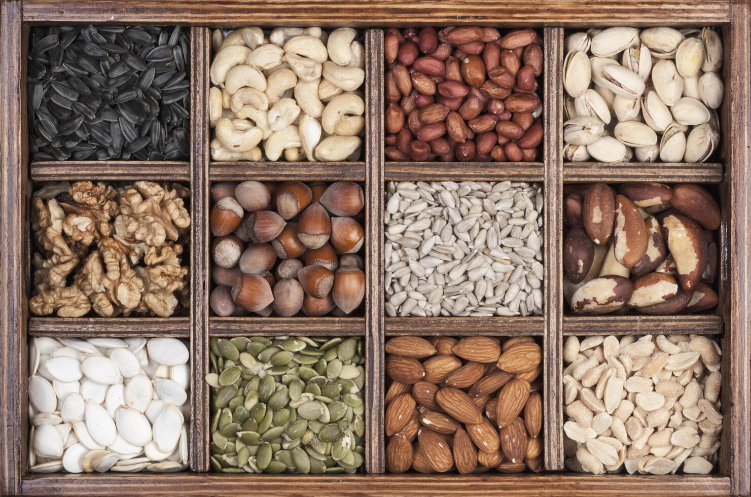 Nutty assortment of nuts in wooden box photo