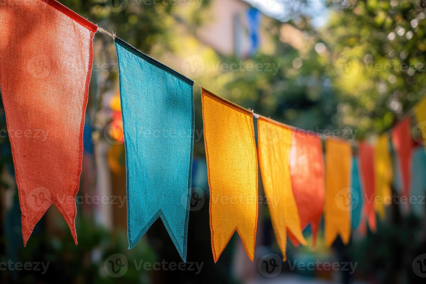 Colorful flags hanging and celebrating a festive event outdoors photo
