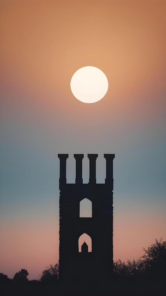 A simple vertical image of an ancient tower silhouette stands against a gradient sky, framed by generous negative space. photo