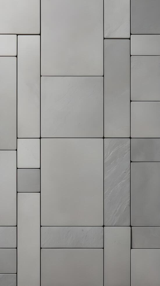 A vertical frame showcasing a pattern of smooth gray stone tiles, offering clean lines and ample room for text. photo