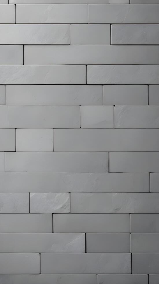 A minimalist vertical background of smooth gray tiles in a linear arrangement, ideal for adding copy in the open spaces. photo