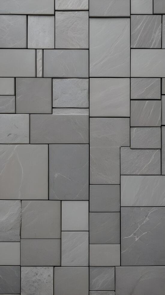 A vertical composition of gray stone tiles laid out in a linear design, offering clean lines and clear areas for copy. photo