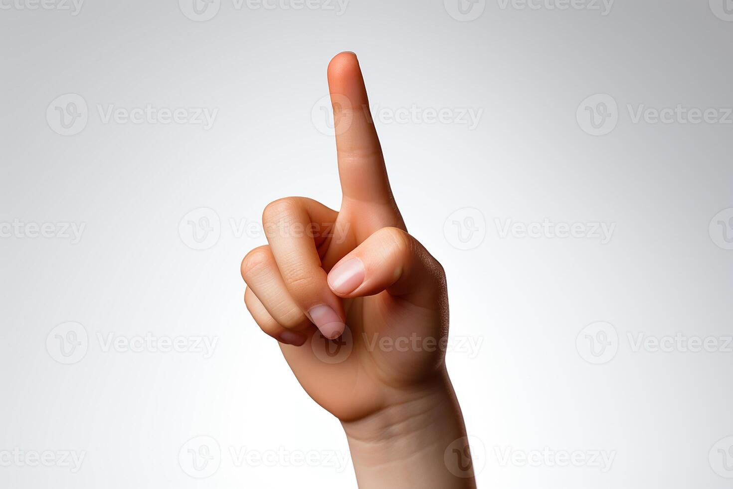Child's hand showing the number 1 with fingers isolated on white background photo