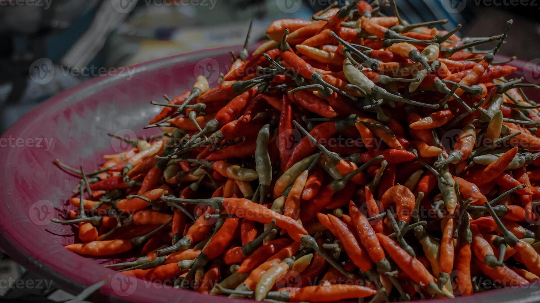 Pile of Red and Green Chili Peppers photo