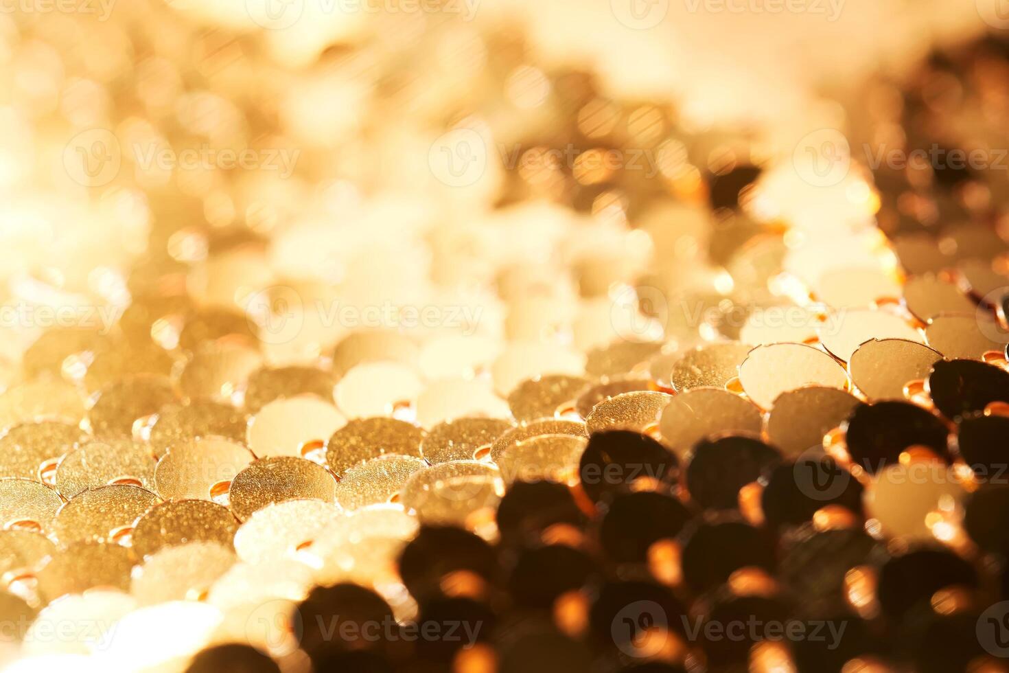 Abstract festive gold background made of sequins. photo