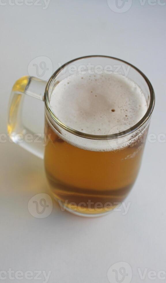 Full Glass Of Classic Lager Beer With Thin Layer Of Foam Stock Photo For Vertical Story