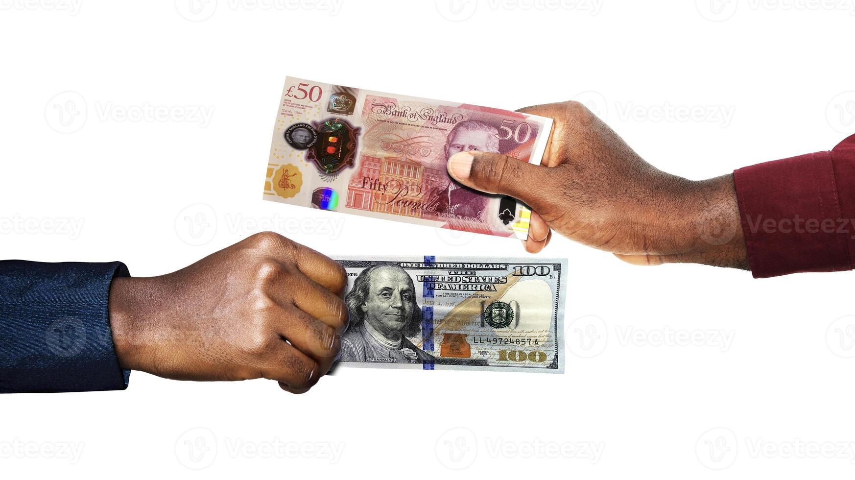 British Pounds Sterling USA Dollar currency pairing.Black African hands holding exchanging comparing two bank notes. British versus USA. Weighing Currencies against each other. Exchange rate photo