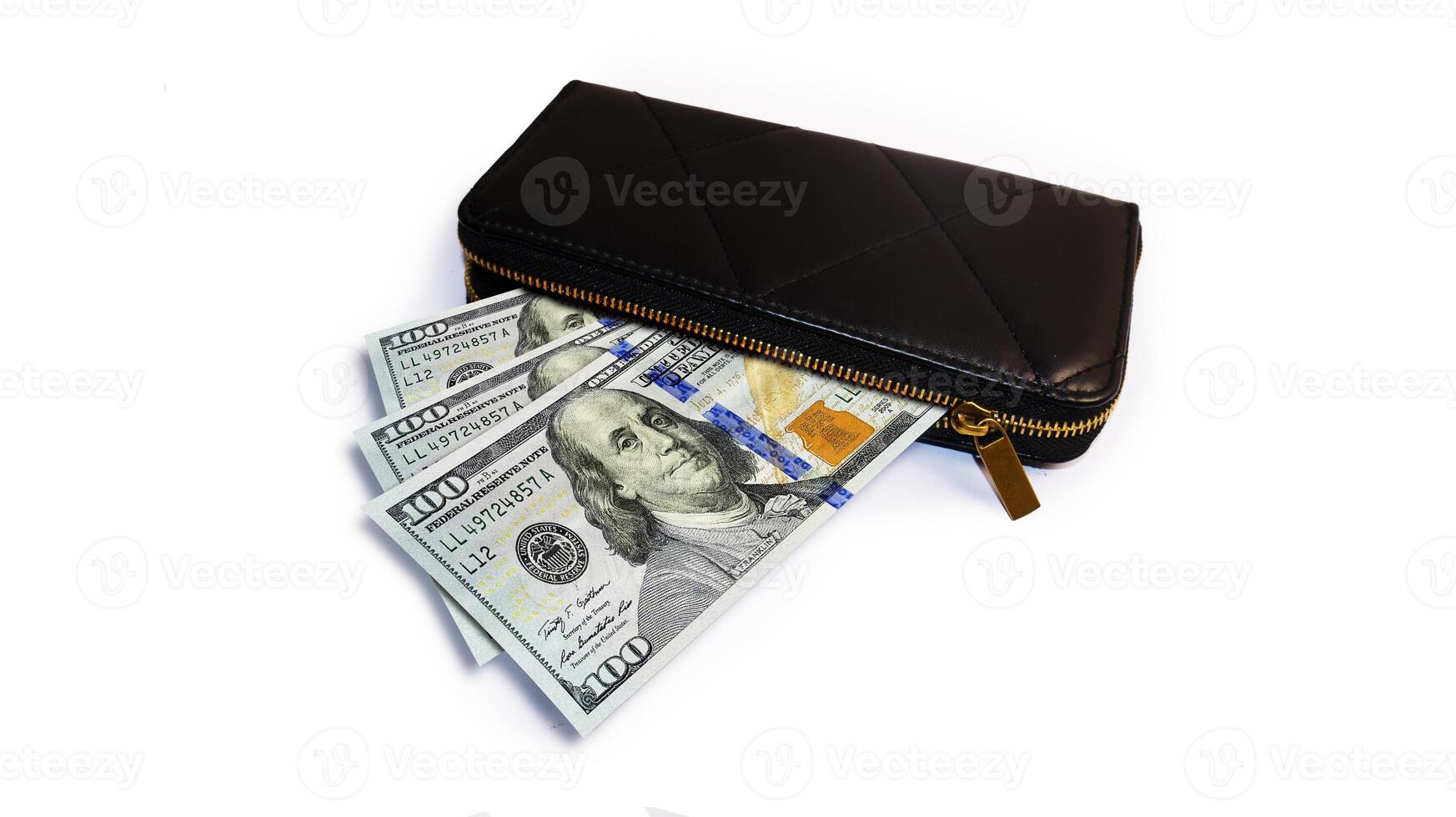 United States Dollars money currency notes inside a black purse isolated on a white background photo