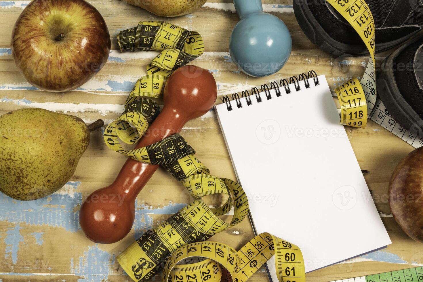 fruit for weight loss with measuring tape and equipment for exercise and diet, weight loss photo