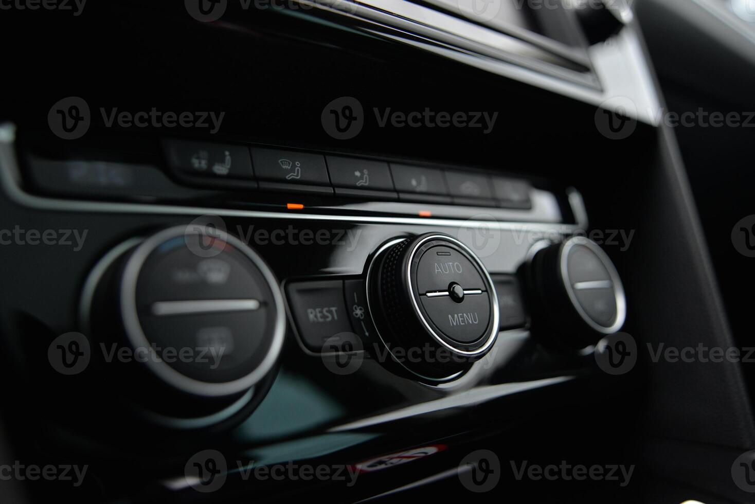 Close up of modern car's climate control panel Sleek design intuitive interface photo