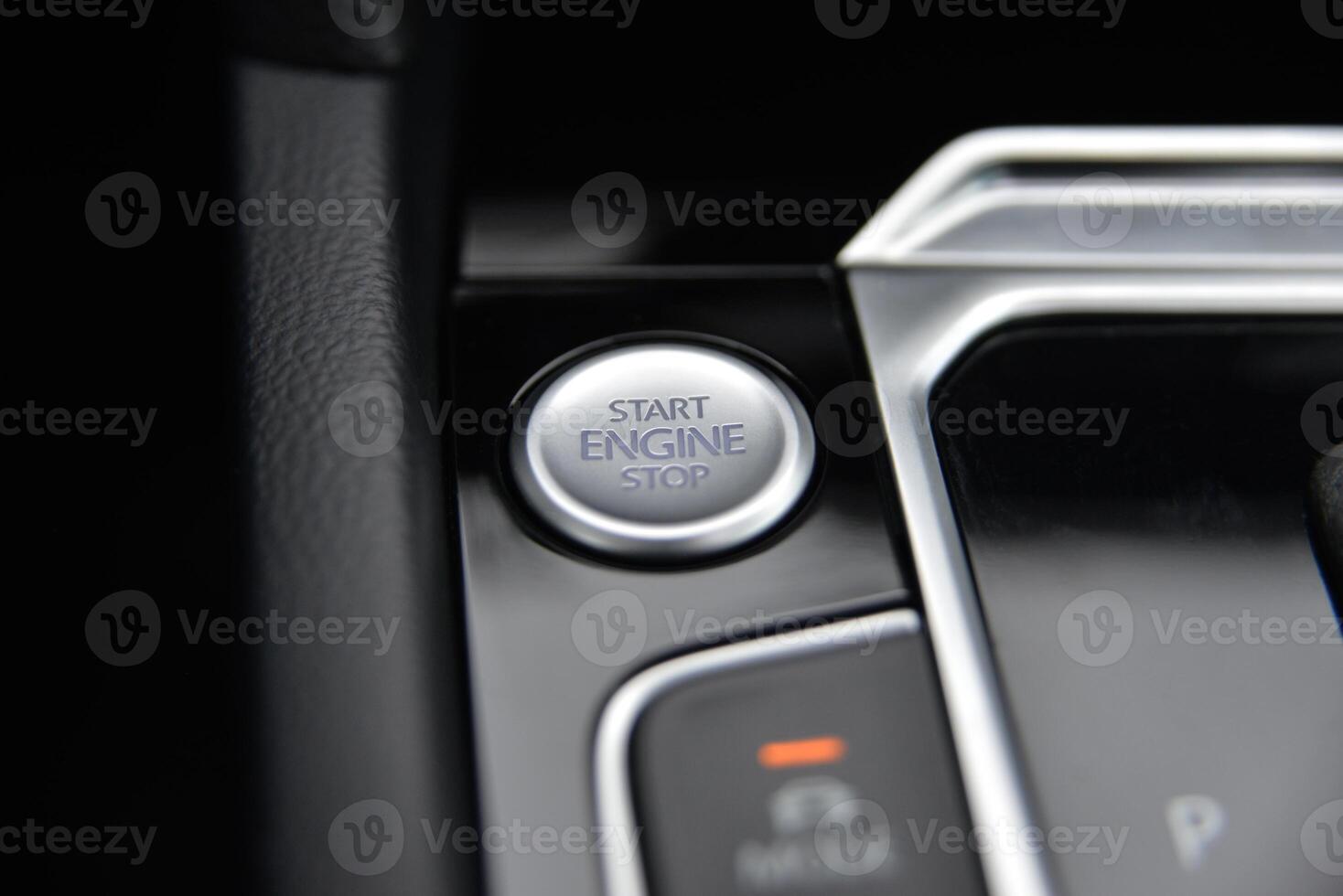 Close up of a car's push button start engine ignition system photo