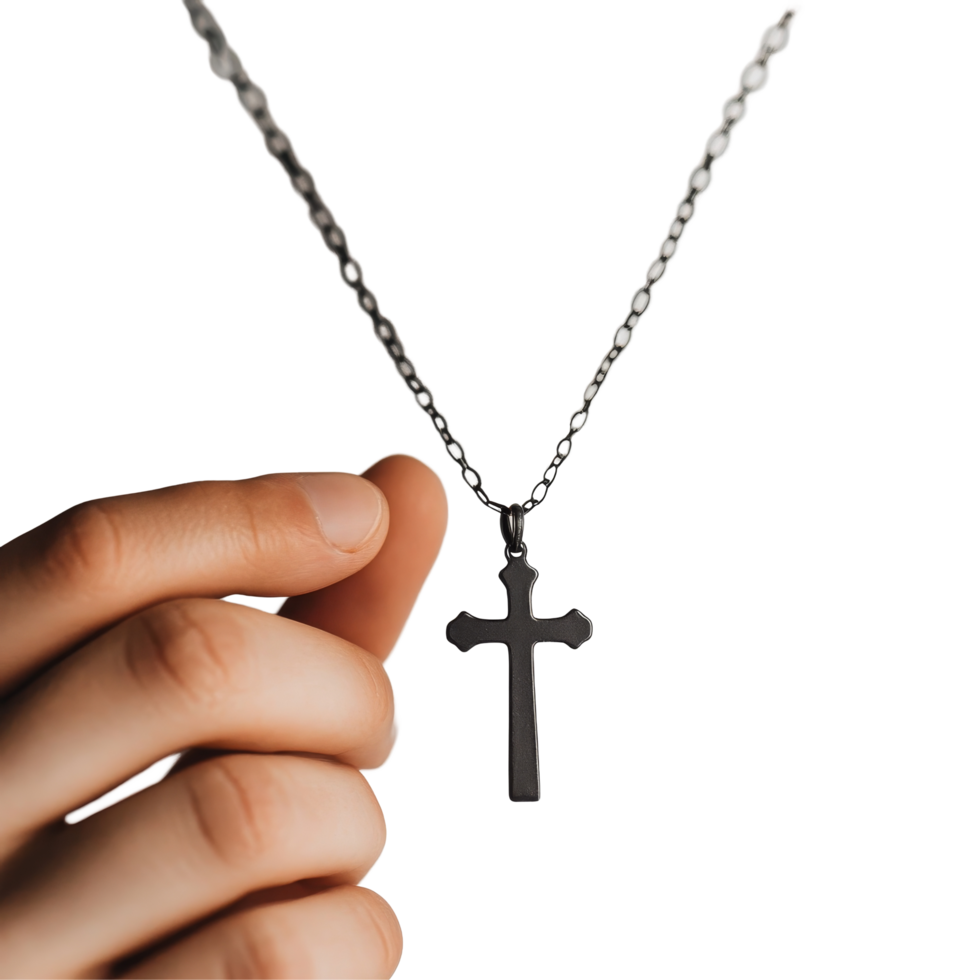Hand holding a Christian cross necklace against a transparent background in a serene indoor setting, Hand Holding a Christian Cross Necklace on transparent background png