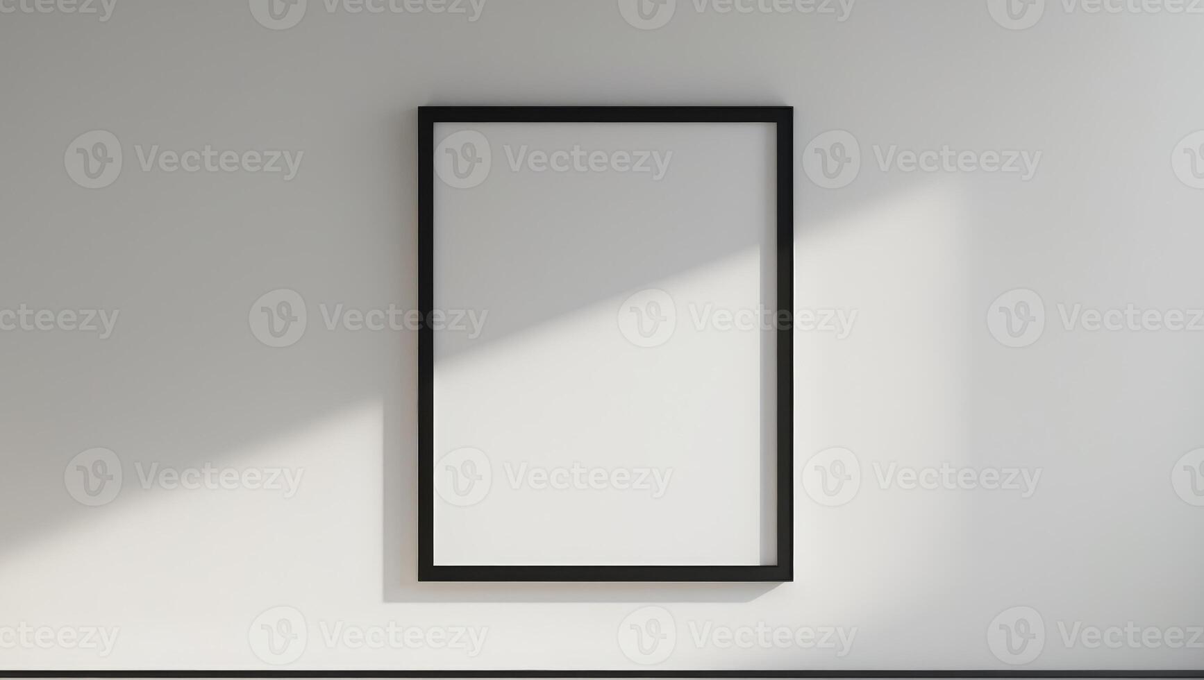 Blank Black Frame Hanging on a Wall for Design Presentation photo