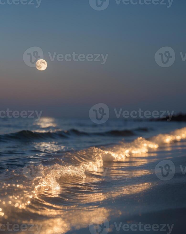 Glowing waves illuminate the shore under a crescent moon at twilightGlowing waves illuminate the shore under a crescent moon at twilight. photo