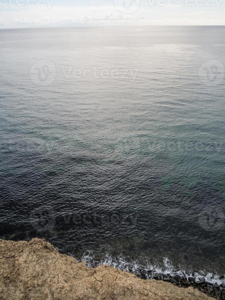 deep blue sea, vertical view, copy space photo