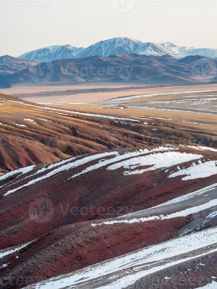 Unusual texture of the mountains, there is snow in the veins of the rock photo