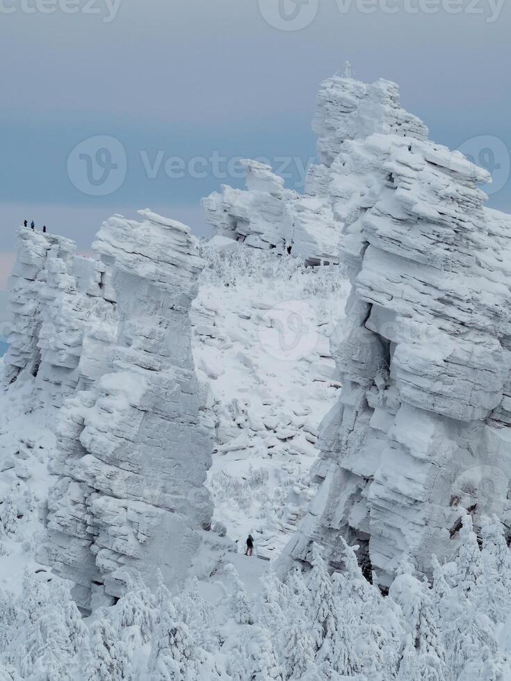 A huge mountain plastered of snow. photo