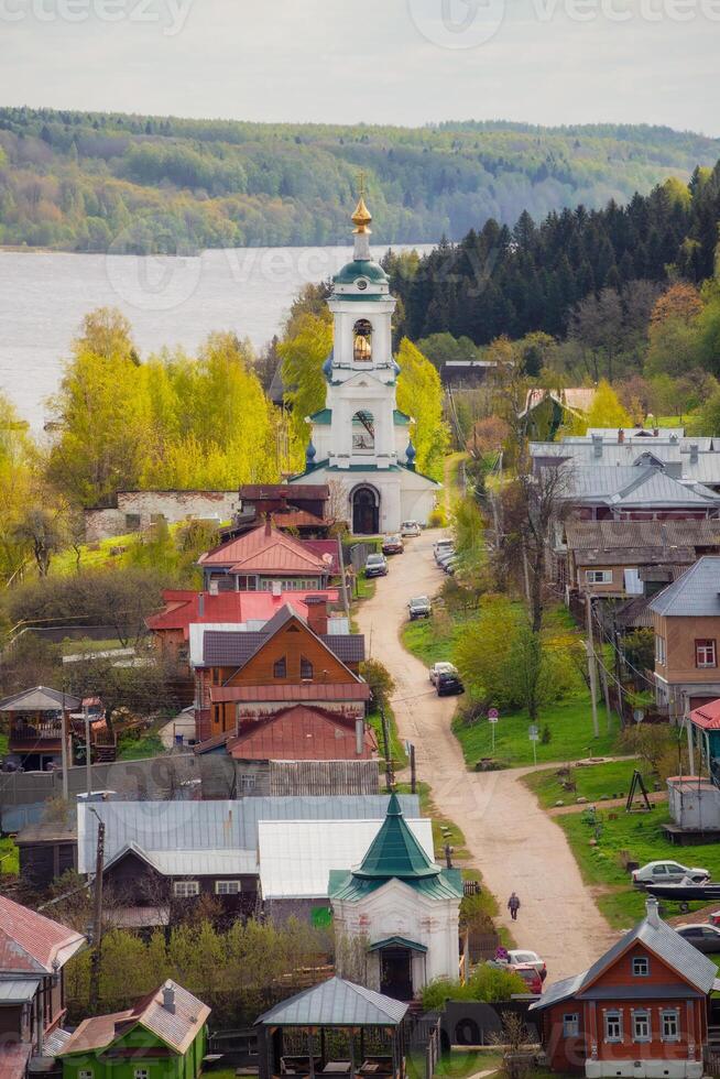 Urban spring top view of the city of Ples. photo