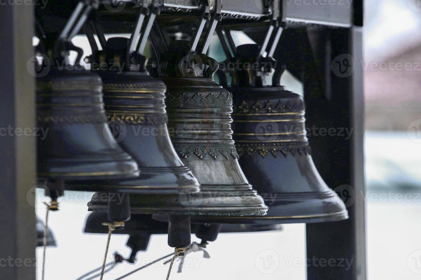 Ancient church tower big bell close up photo