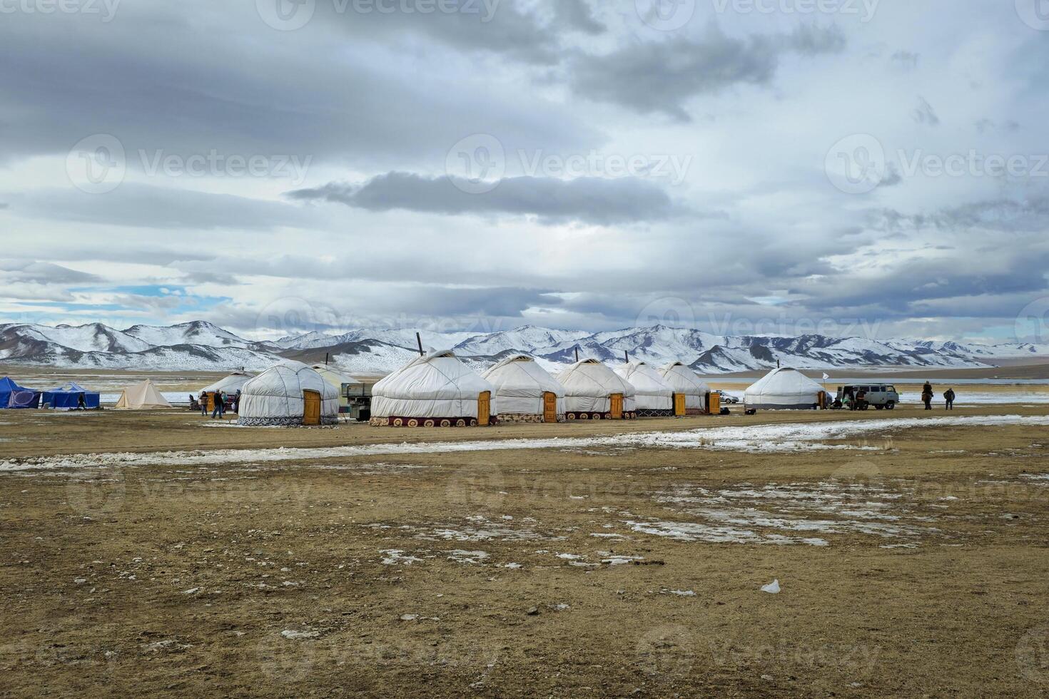 Yurt camping of Kazakh nomads. Mongolian winter steppe. photo