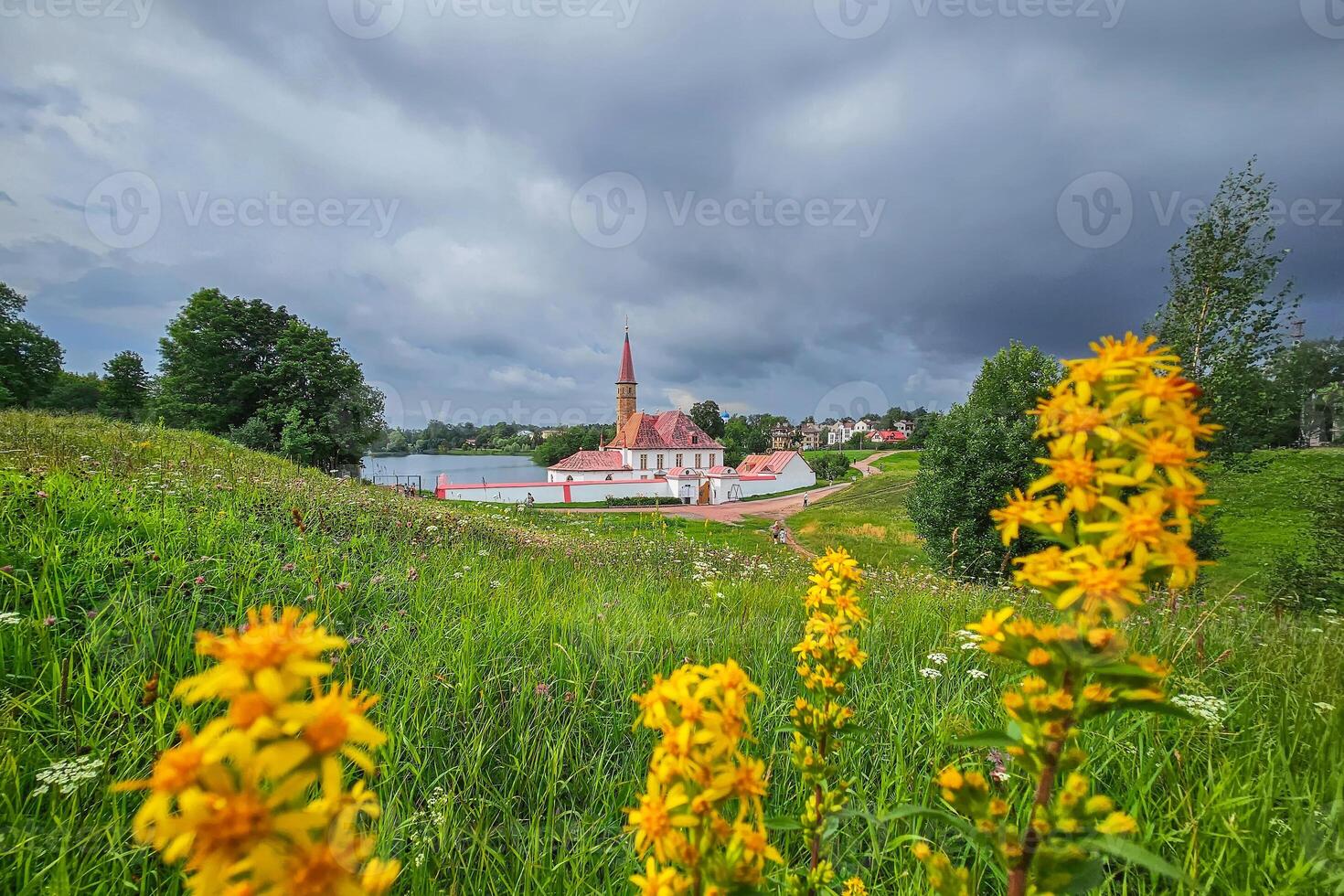 Landscape with old castle in a beautiful dramatic summer day. photo