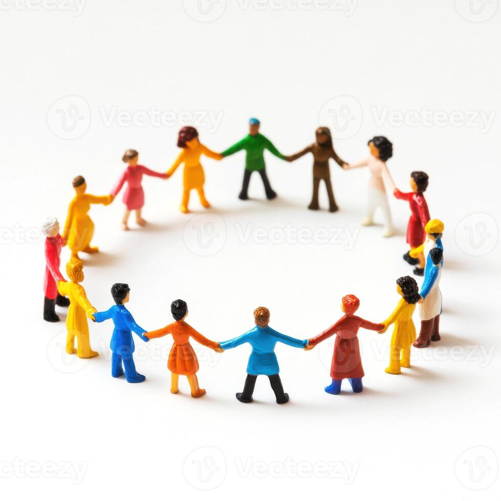 Colorful figurines form a circle holding hands, symbolizing unity and diversity at a community gathering in a bright setting photo