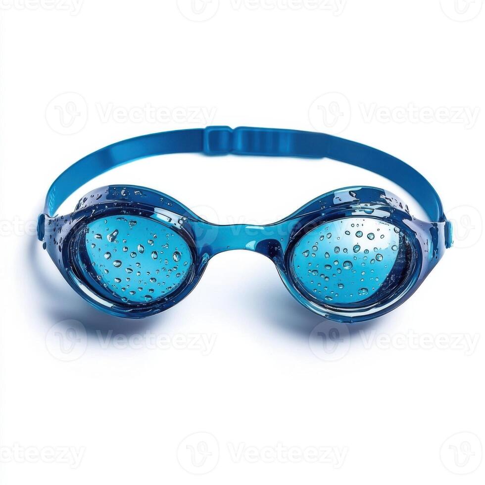Blue swimming goggles with water droplets on the lenses placed on a white surface after a swim photo