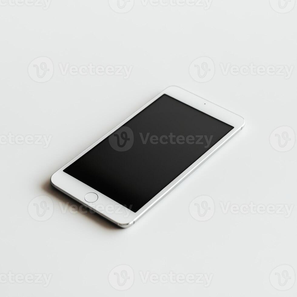 Smartphone resting on a plain surface showcasing a sleek design and minimalistic style with a dark screen in a bright environment photo