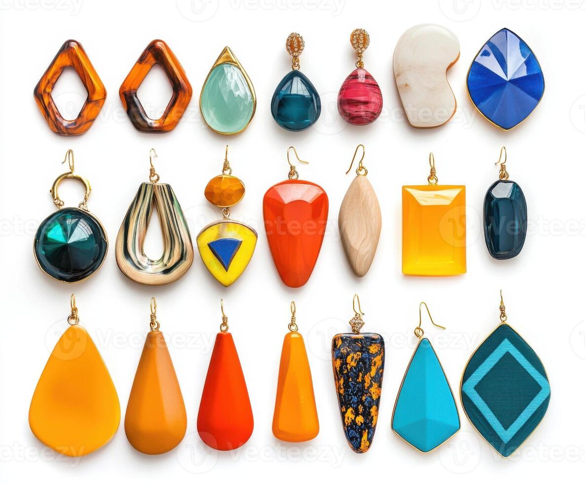 Colorful collection of handmade earrings in various shapes and styles displayed on a white background photo