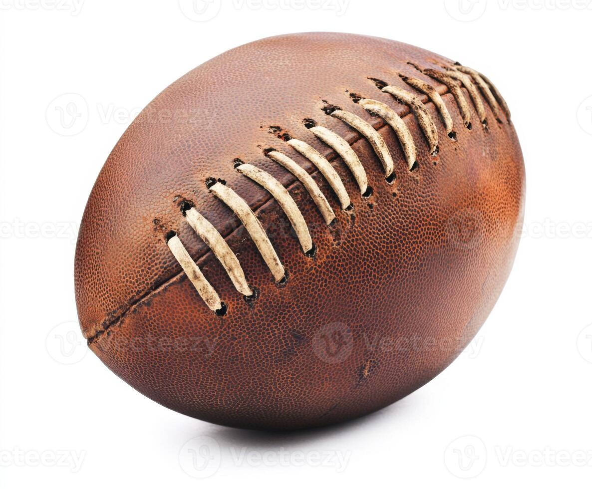 Leather football resting on a white surface highlighting its vintage design and texture photo