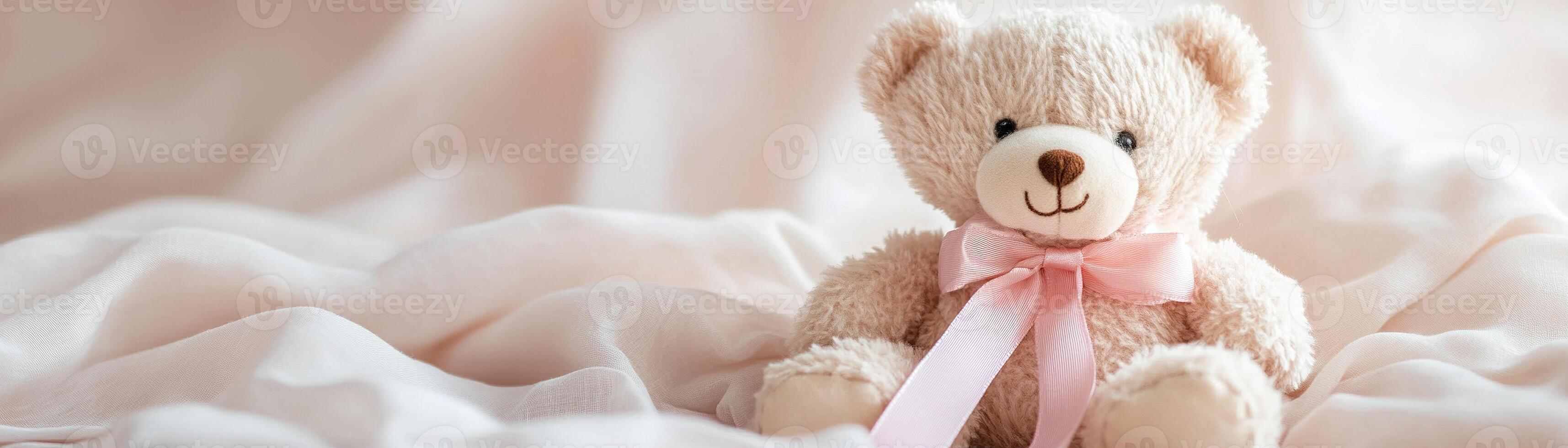 A charming teddy bear adorned with a pink ribbon bow sits cozily on a soft pastel linen fabric. The ample negative space enhances its adorable presence, creating a calming atmosphere photo
