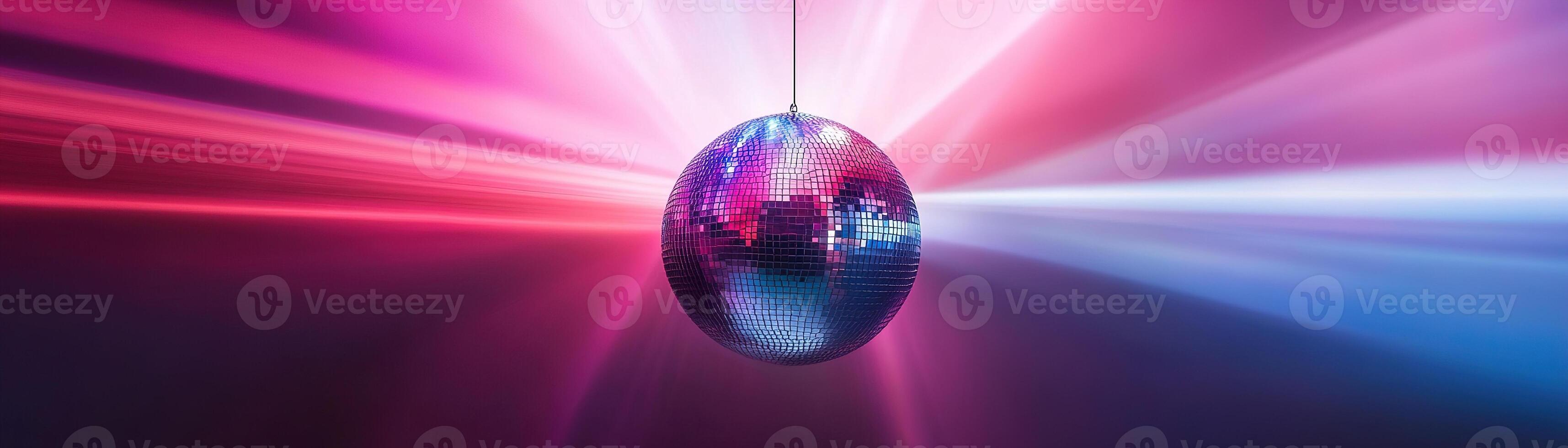 A shiny silver disco ball hangs in the center, reflecting colorful beams of pink, purple, and blue light against a dark gradient background. Perfect for presentations or events photo