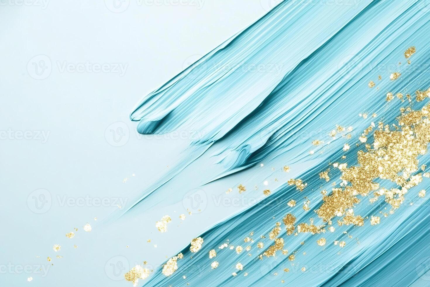 An artistic background showcases gentle, flowing brush strokes in soothing pastel blue, enriched with delicate gold specks against a clean, neutral backdrop, ideal for creative projects photo