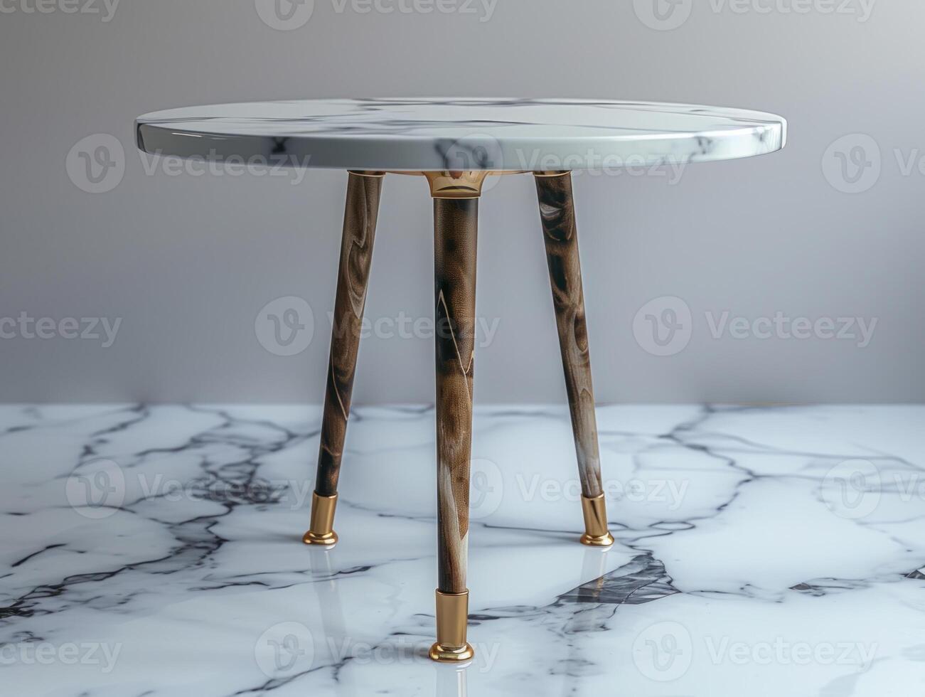 A white marble top table with wooden legs and gold accents photo