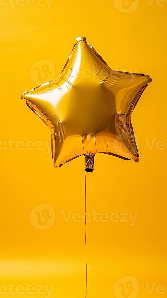 A Shiny Gold Star Balloon on a Vibrant Yellow Background photo