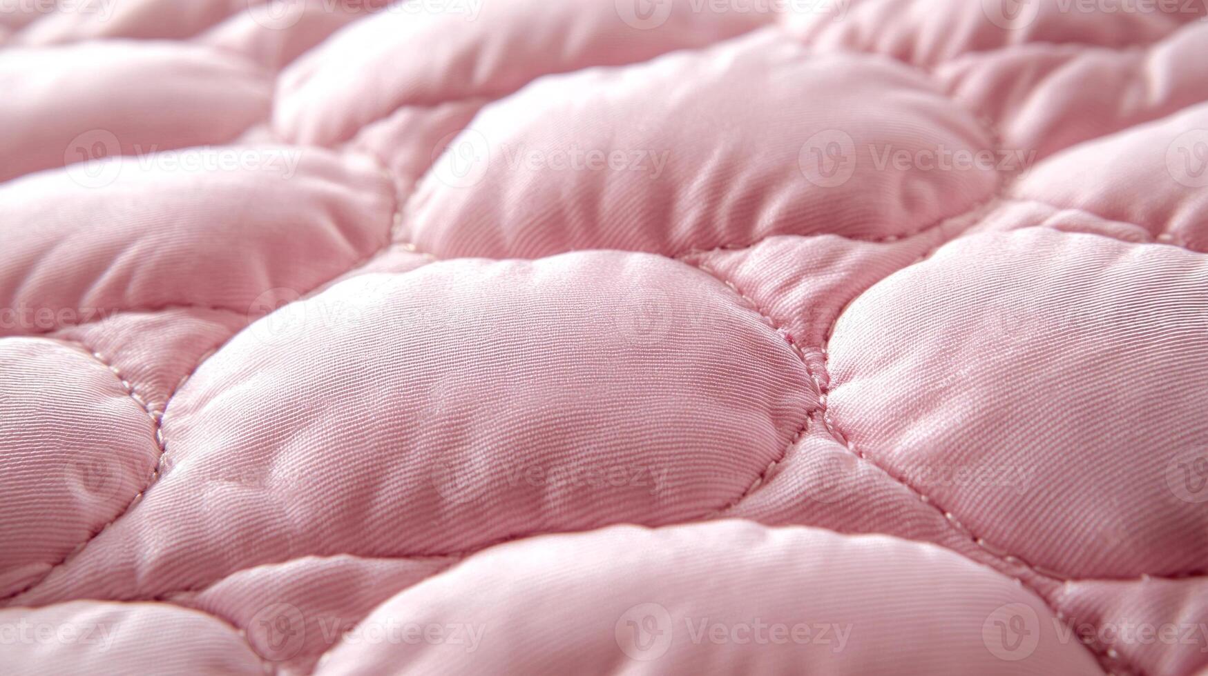 close up captures delicate details of quilted fabric emphasizing padded texture and sheen. vibrant hues lend modern inviting feel perfect for contemporary decor photo