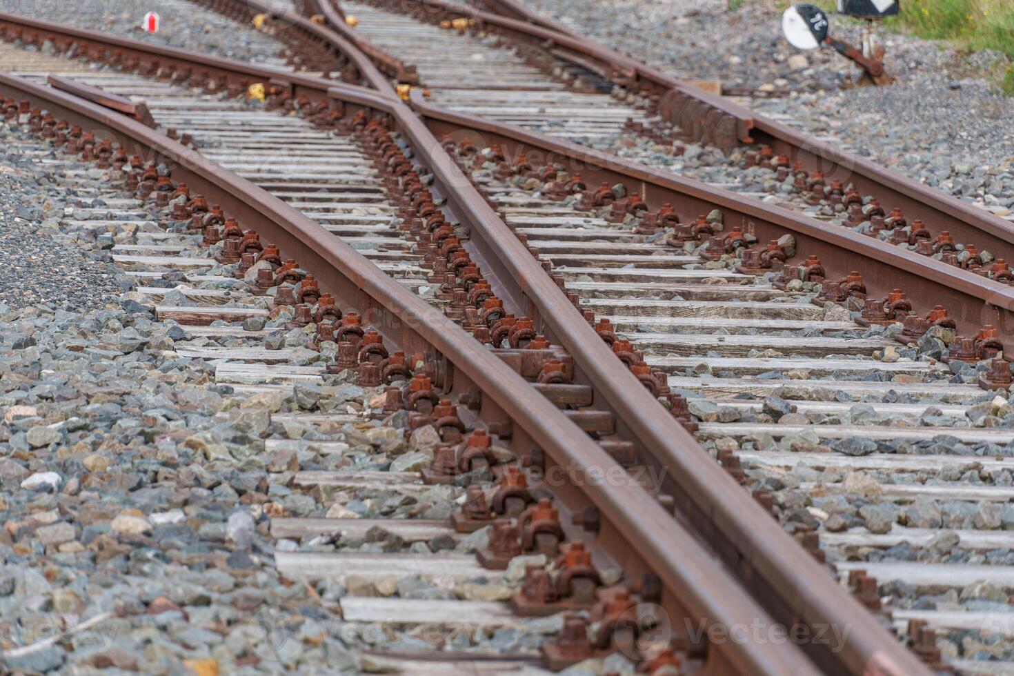 A train track with a stop sign on it photo