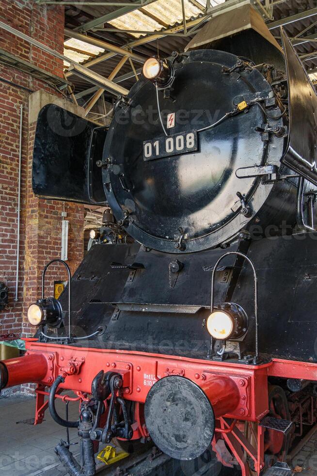 A black and red steam trasin photo
