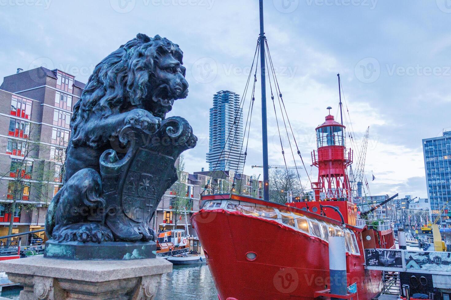 A statue of a lion and a ship photo