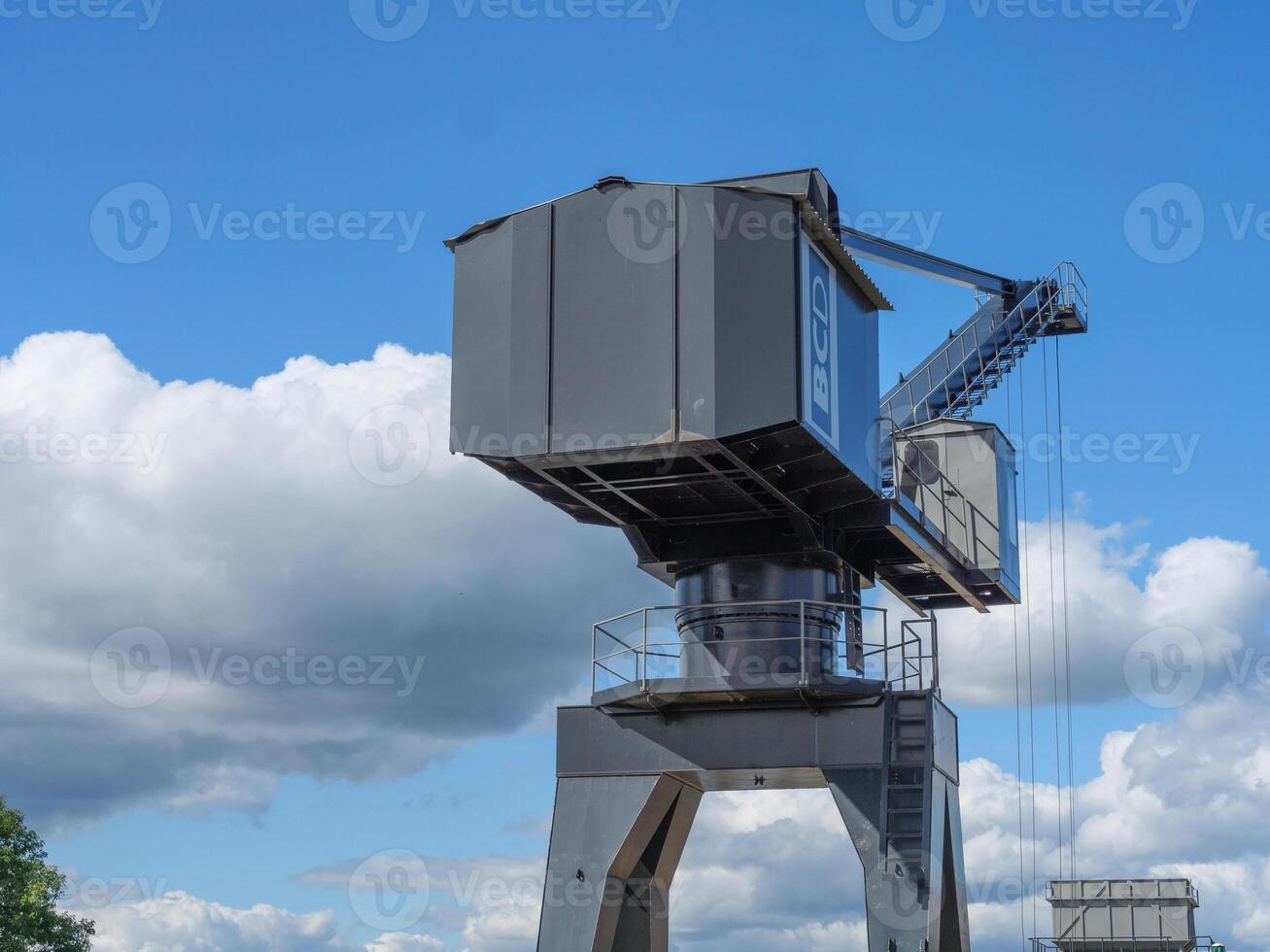 A large crane on a dock photo