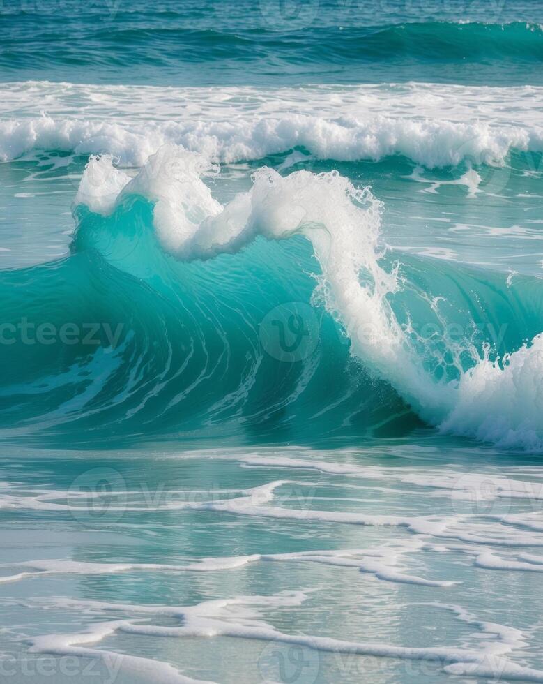 Turquoise Ocean Wave Crashing with White Foam and Blue Water photo