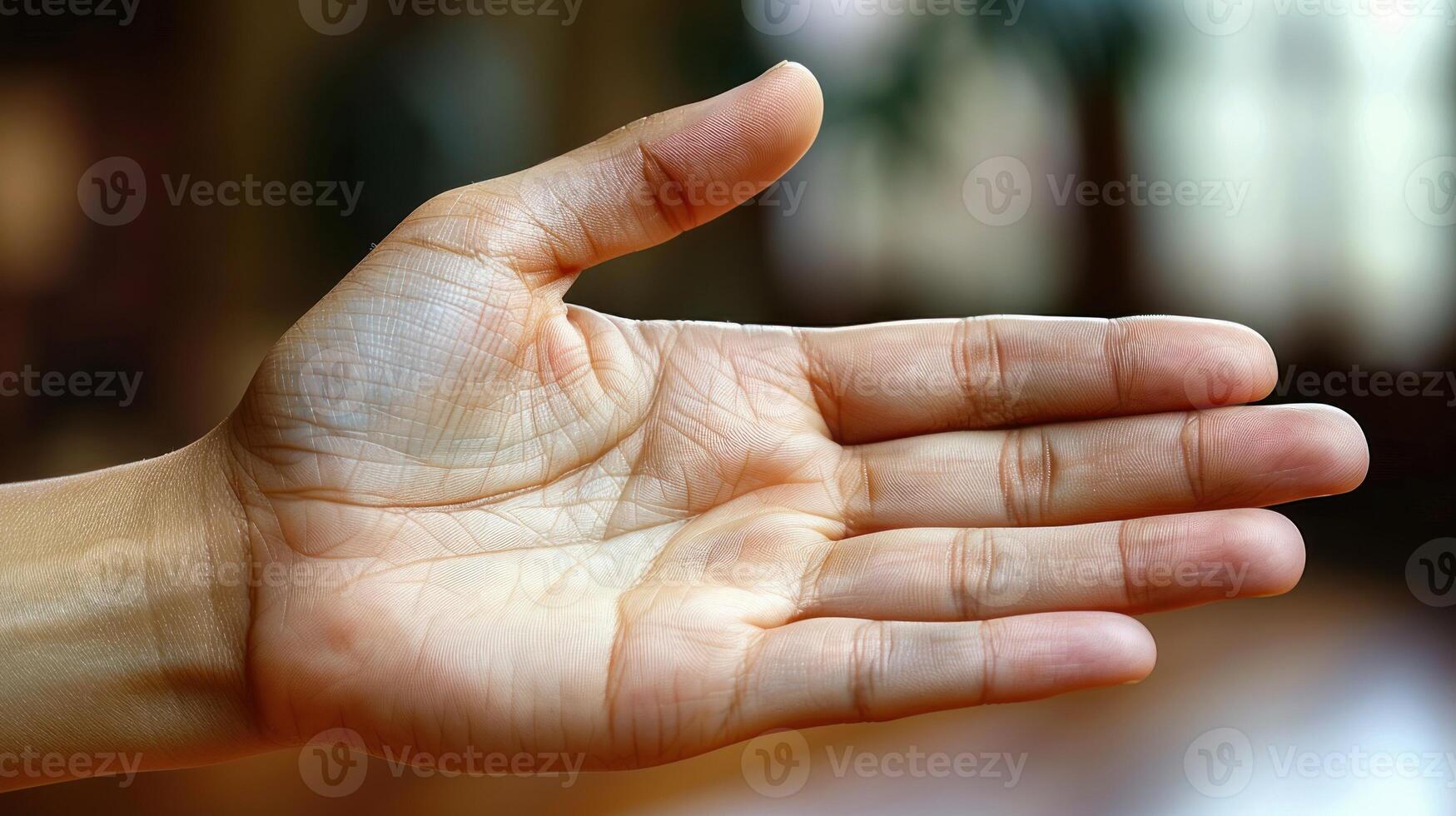 Close-up of a hand reaching out photo