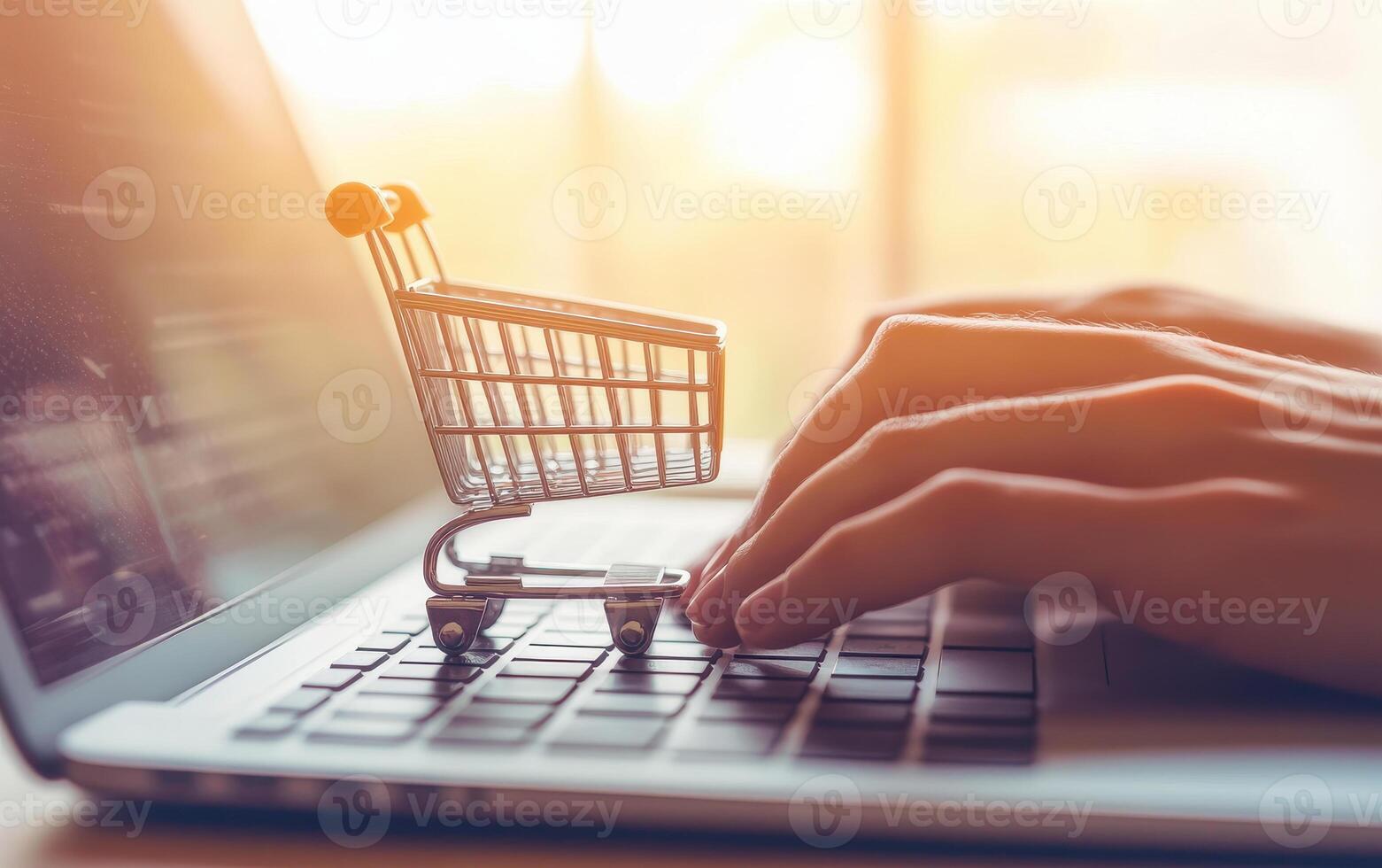 Hands typing on laptop with shopping cart, representing online shopping and digital commerce. scene captures essence of modern retail and convenience photo