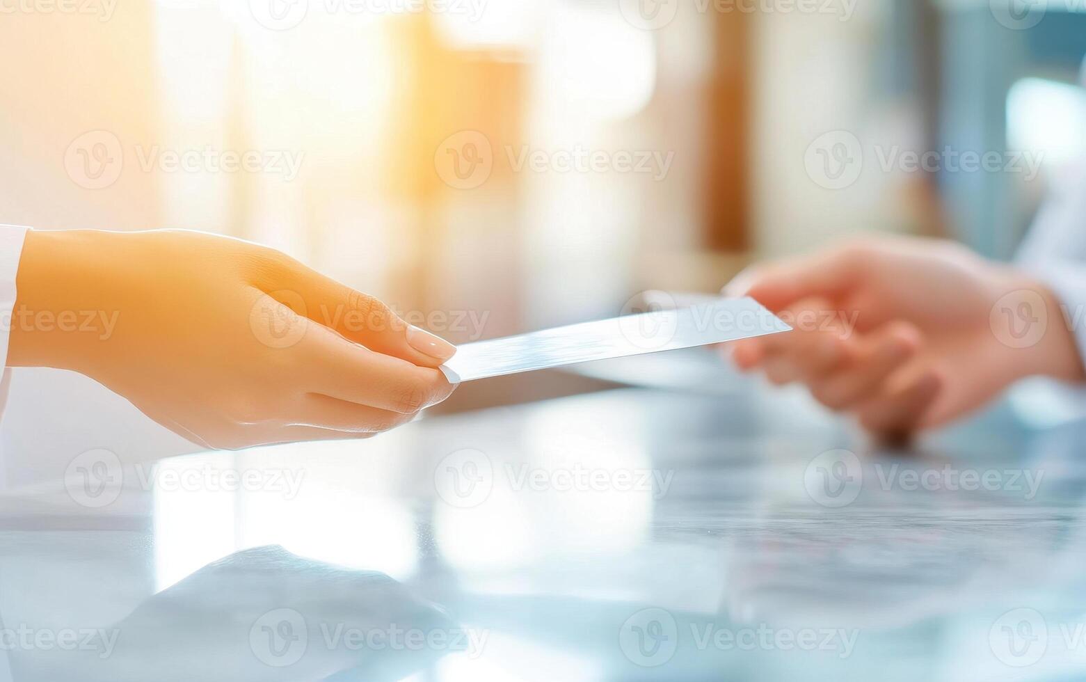 Hands exchanging health insurance cards in bright setting, symbolizing care and support photo