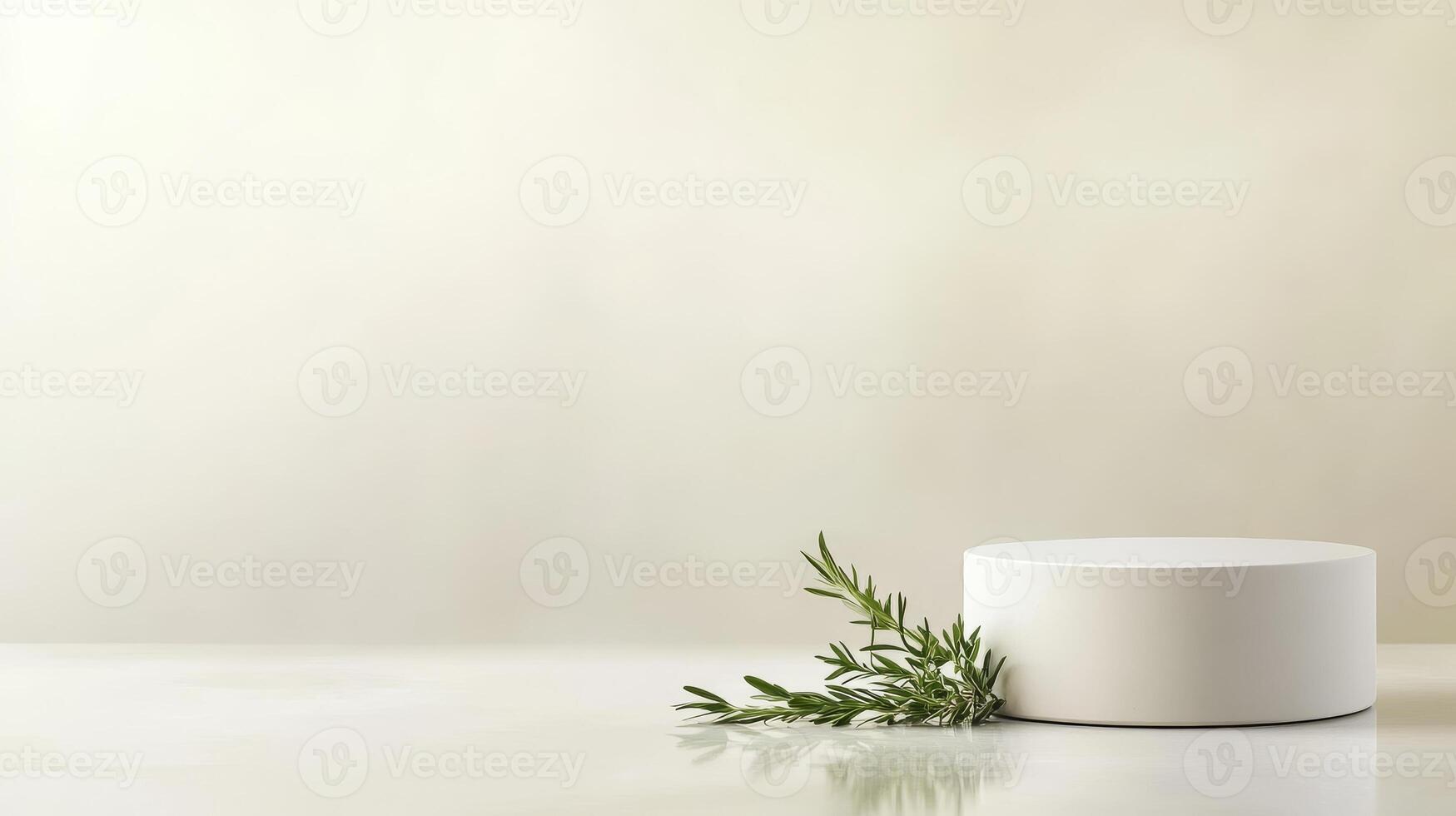 Simple white pedestal with a green sprig against a soft neutral background in a minimalist setting photo