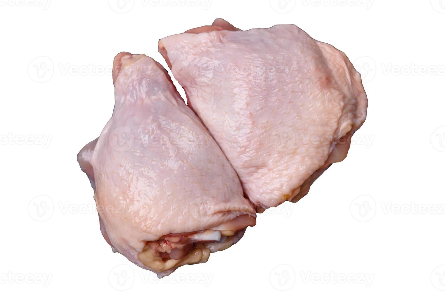 Fresh raw chicken thighs with salt photo